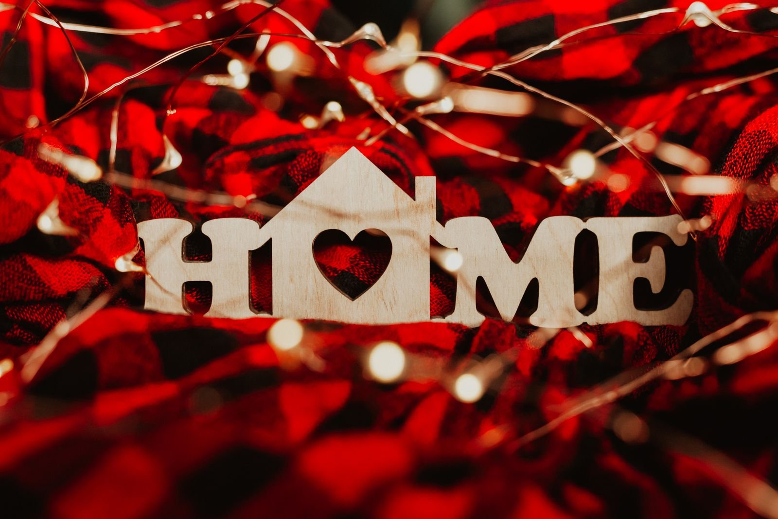 Wooden Home sign with warm fairy lights, a simple plaque idea for an entryway wall
