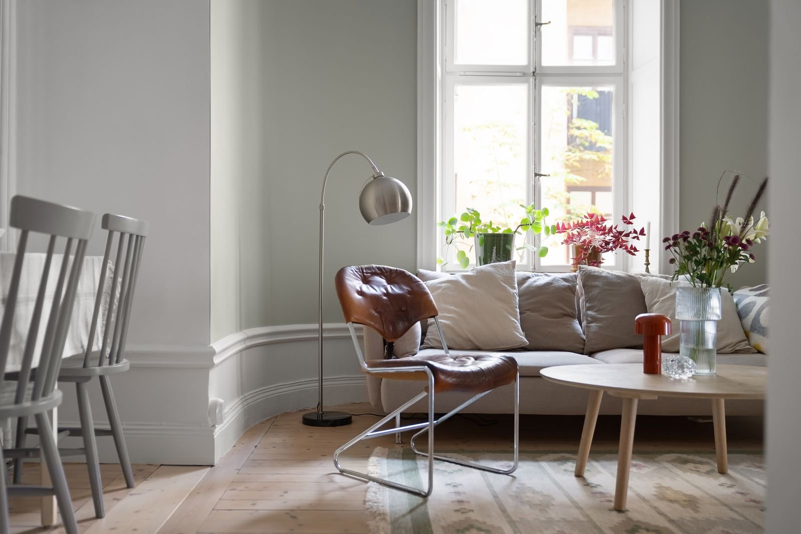 Bright Scandinavian living room with light furniture and plenty of natural light