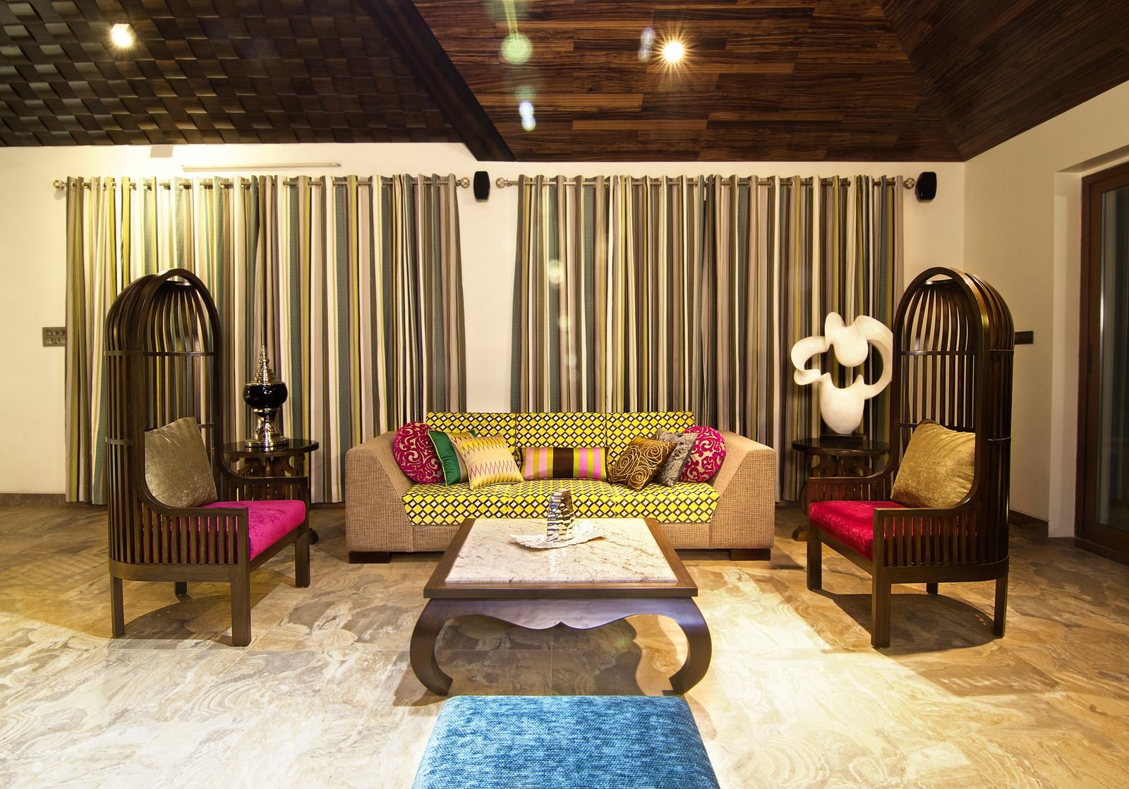 Living room with a colorful sofa and vibrant decor