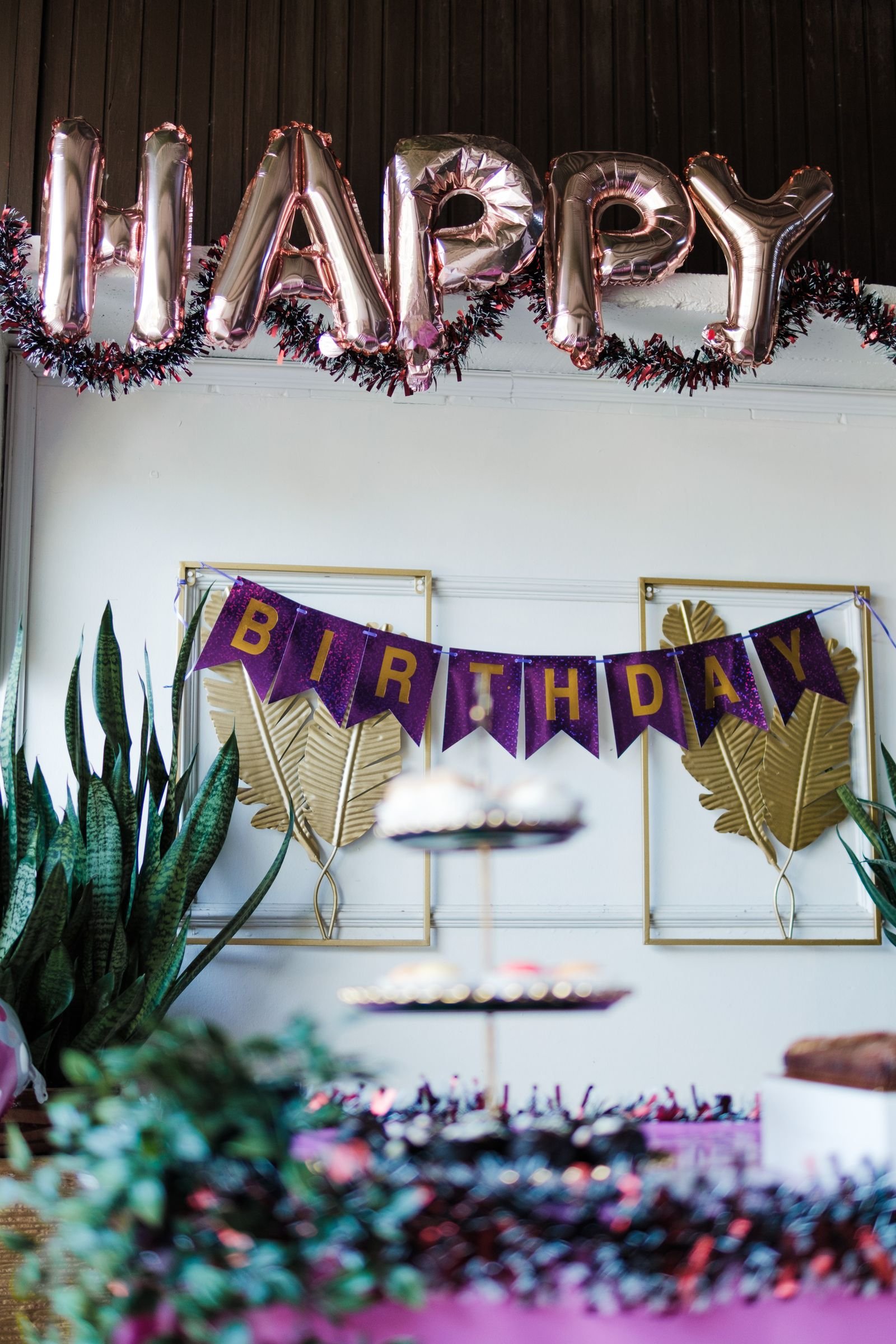 Colorful birthday party corner decorated with balloons and festive banners