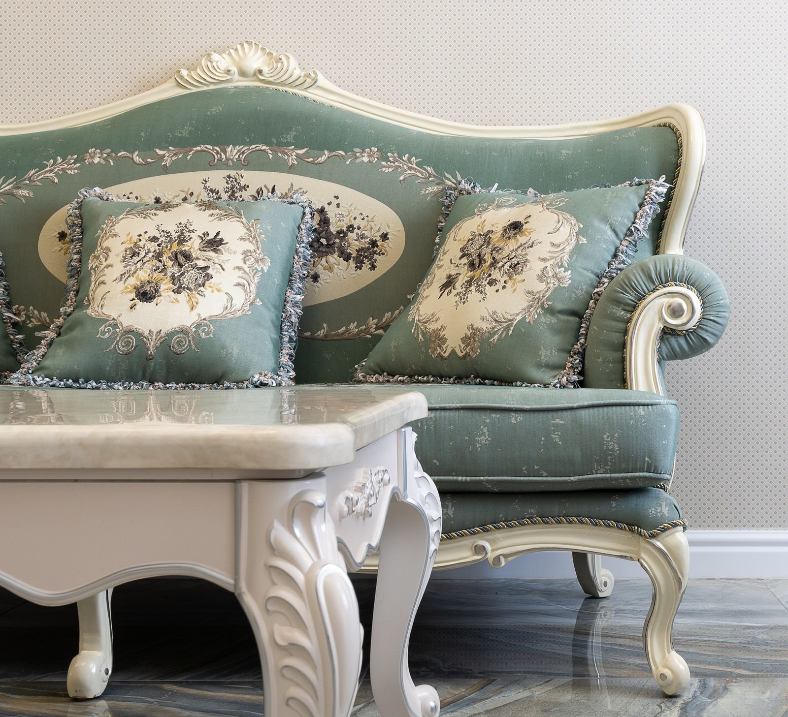 Classic sofa with decorative cushions in a bright living room