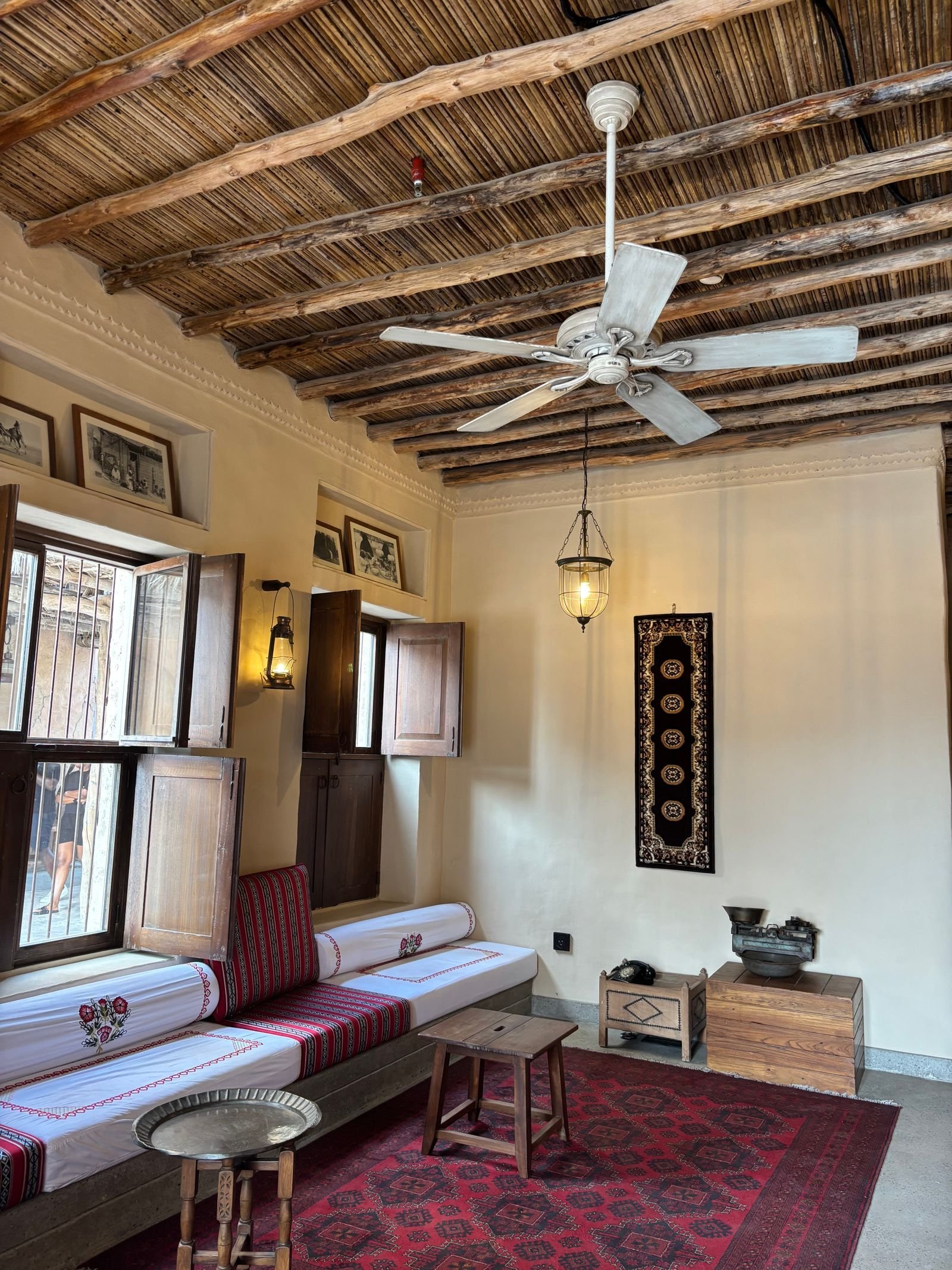 Cozy traditional Arabic-style room with rustic decor.