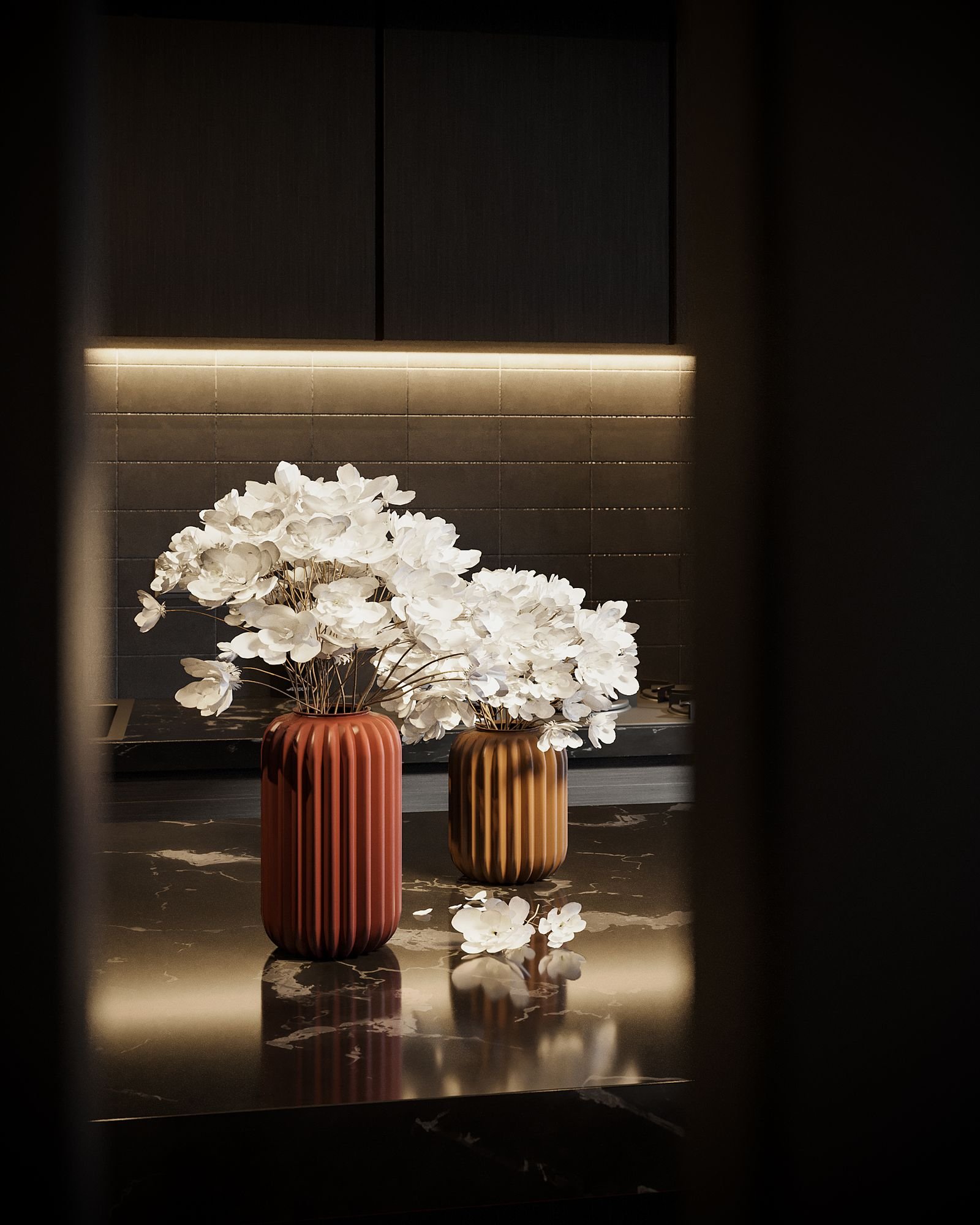 Contemporary interior with flowers in vases on a reflective surface.