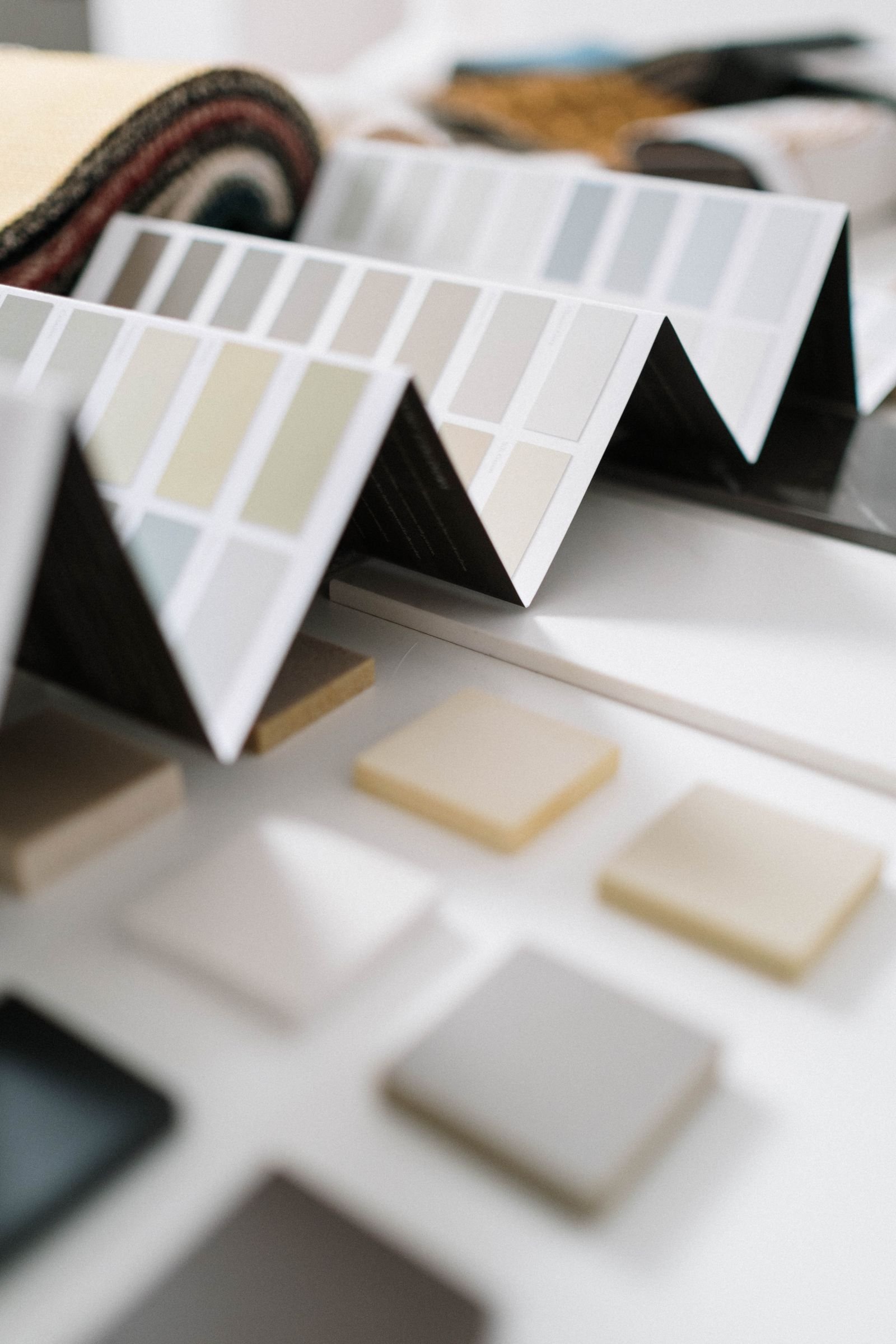 Color swatches and material samples laid out on a table.
