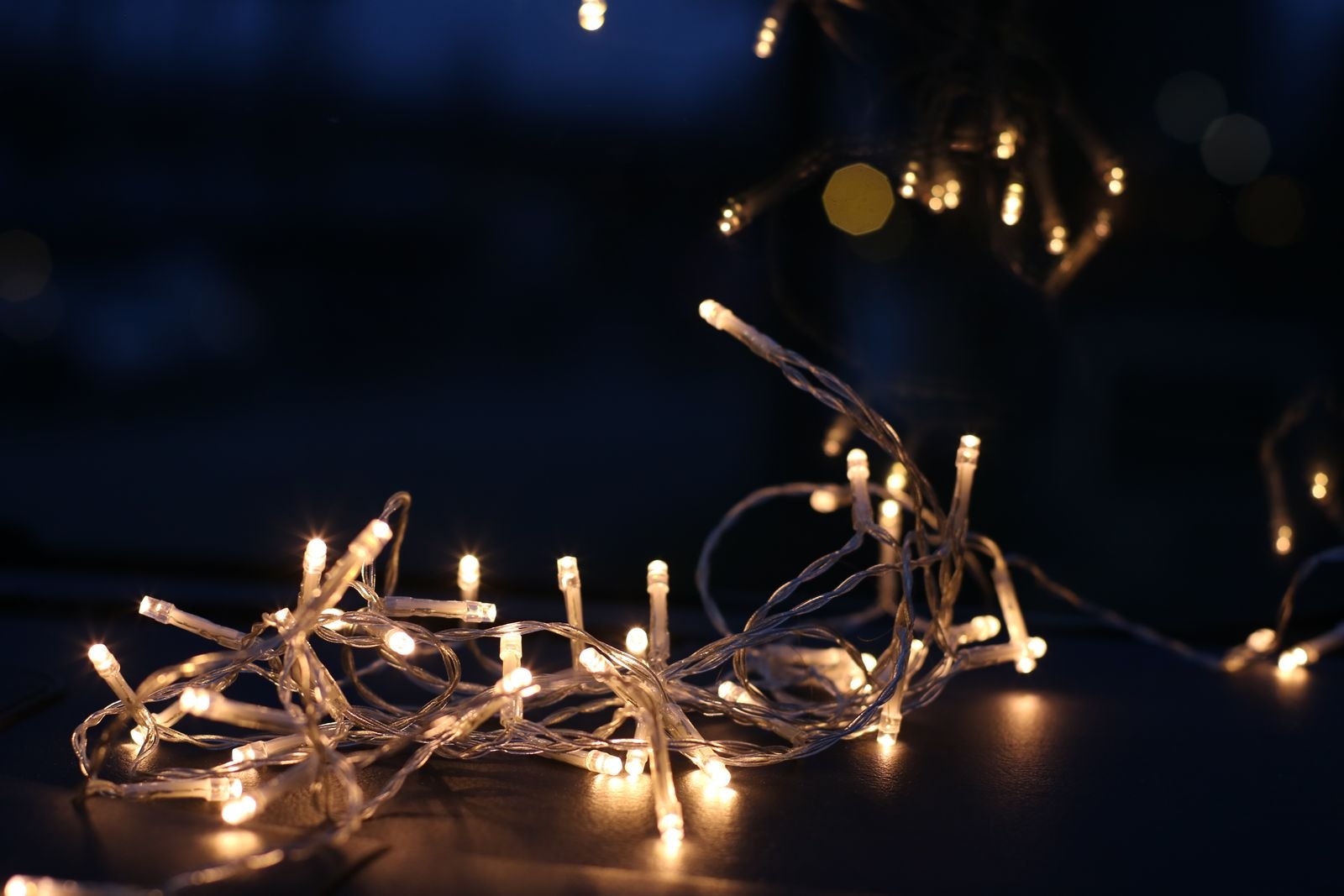 Warm glowing string lights in the evening.