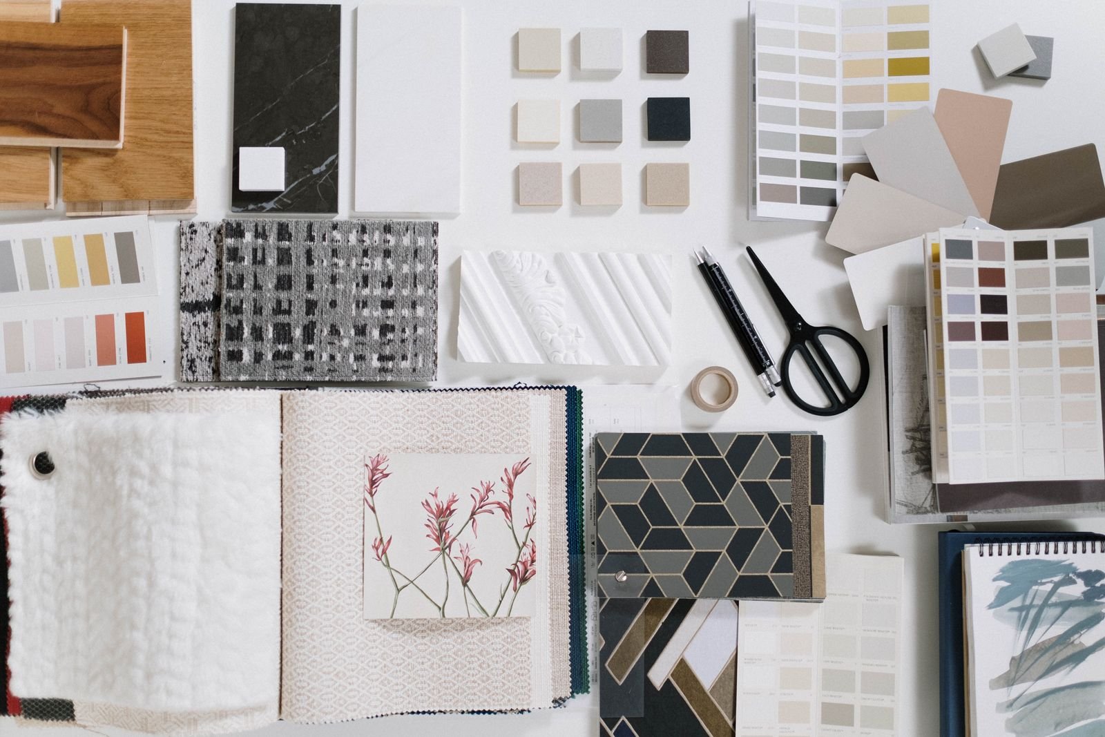 Flat lay of interior design samples showing colors and textures.