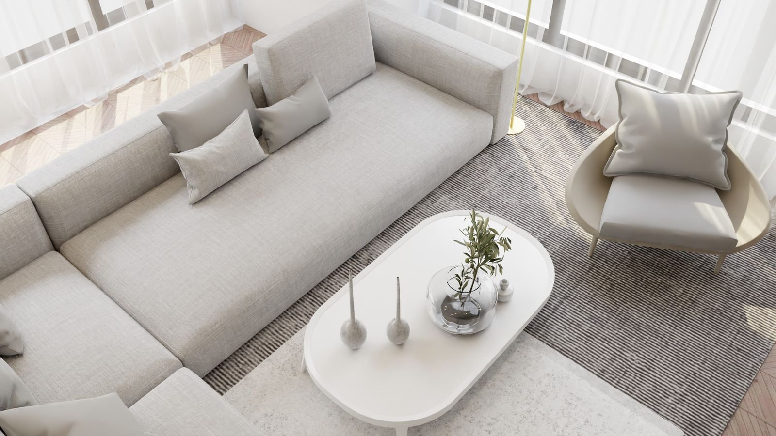 Bright minimalist living room with a beige sofa and simple decor.