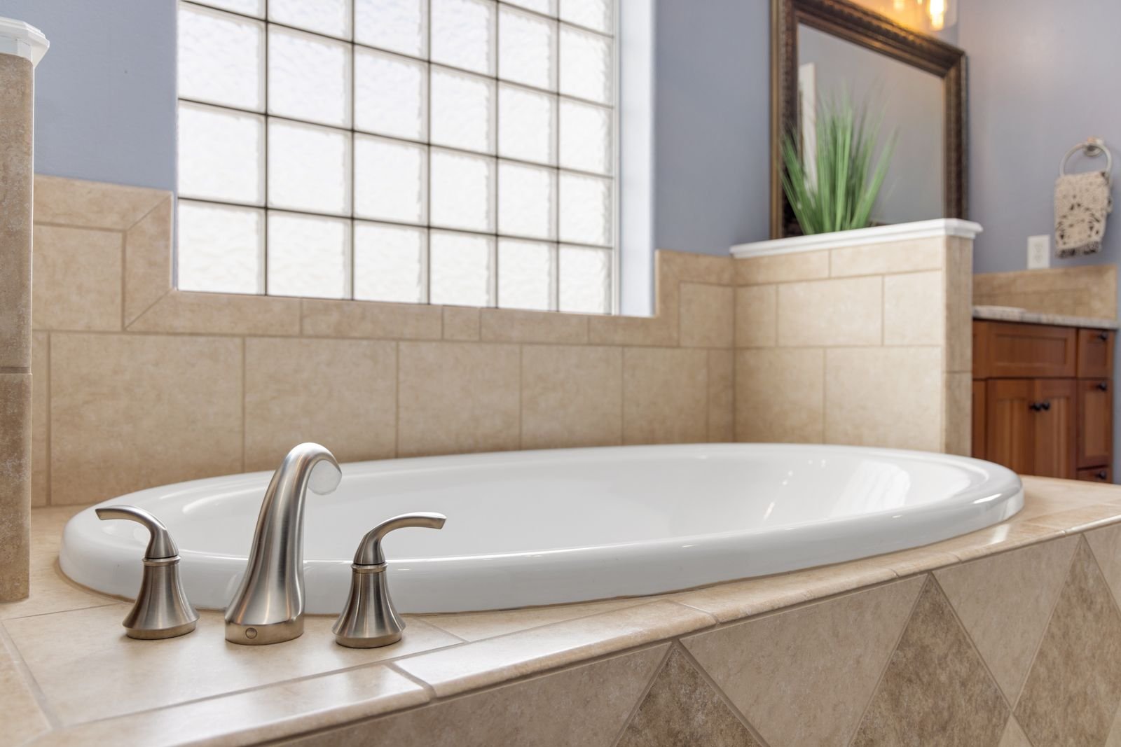 Modern bathroom with an elegant freestanding bathtub and stylish faucet.