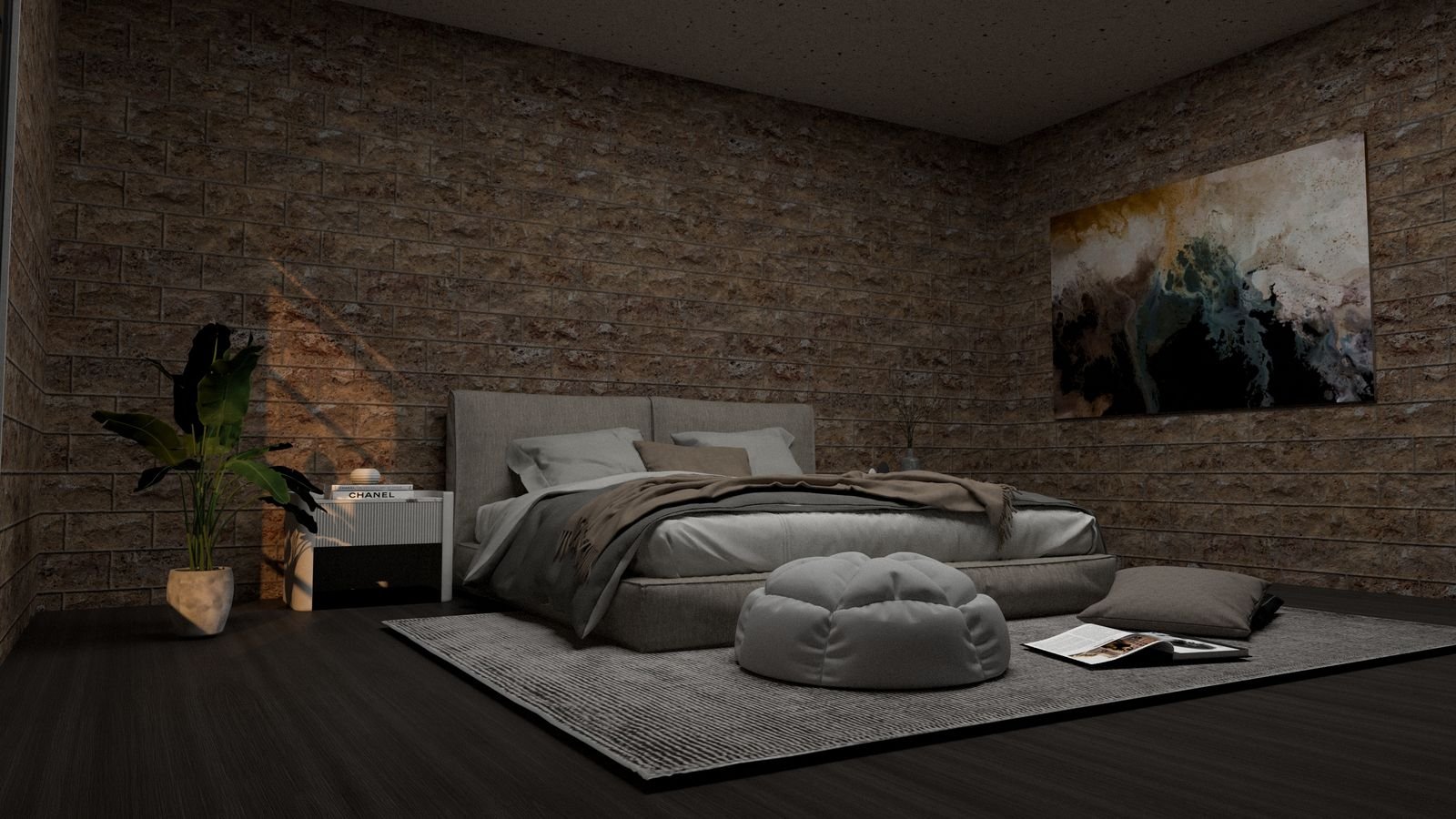 Bed with cushions and a plant against a concrete wall with a painting.