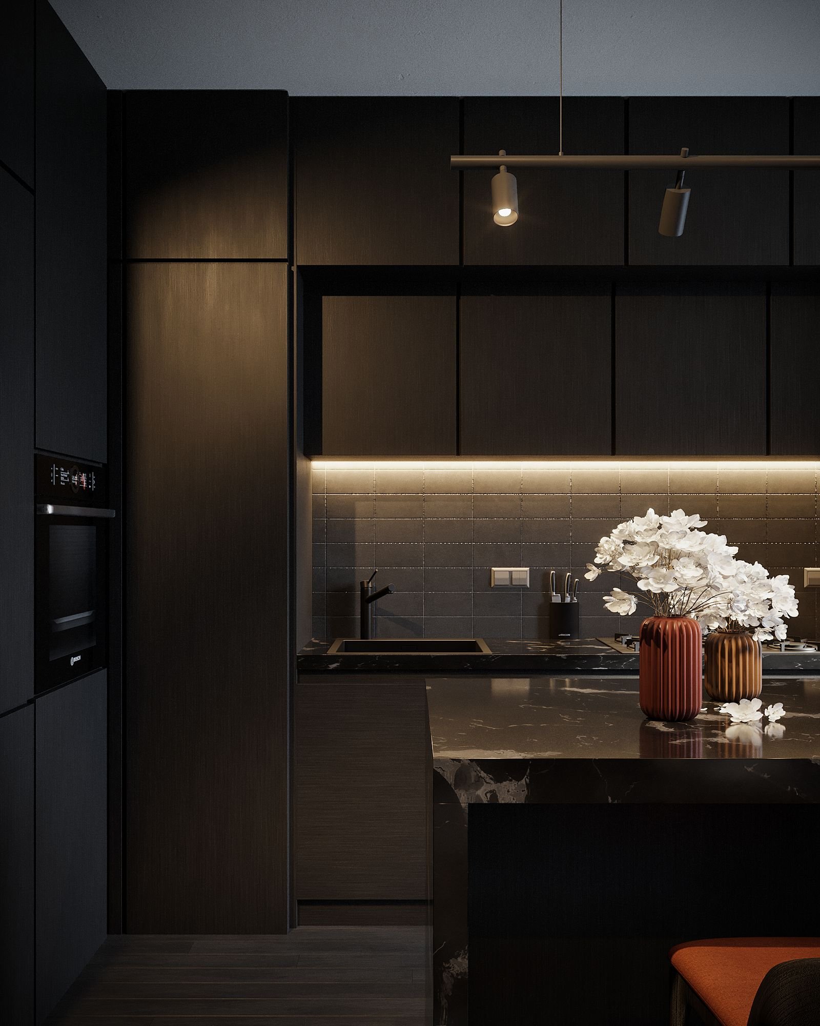 Dark modern kitchen with lit cabinets and a kitchen island.