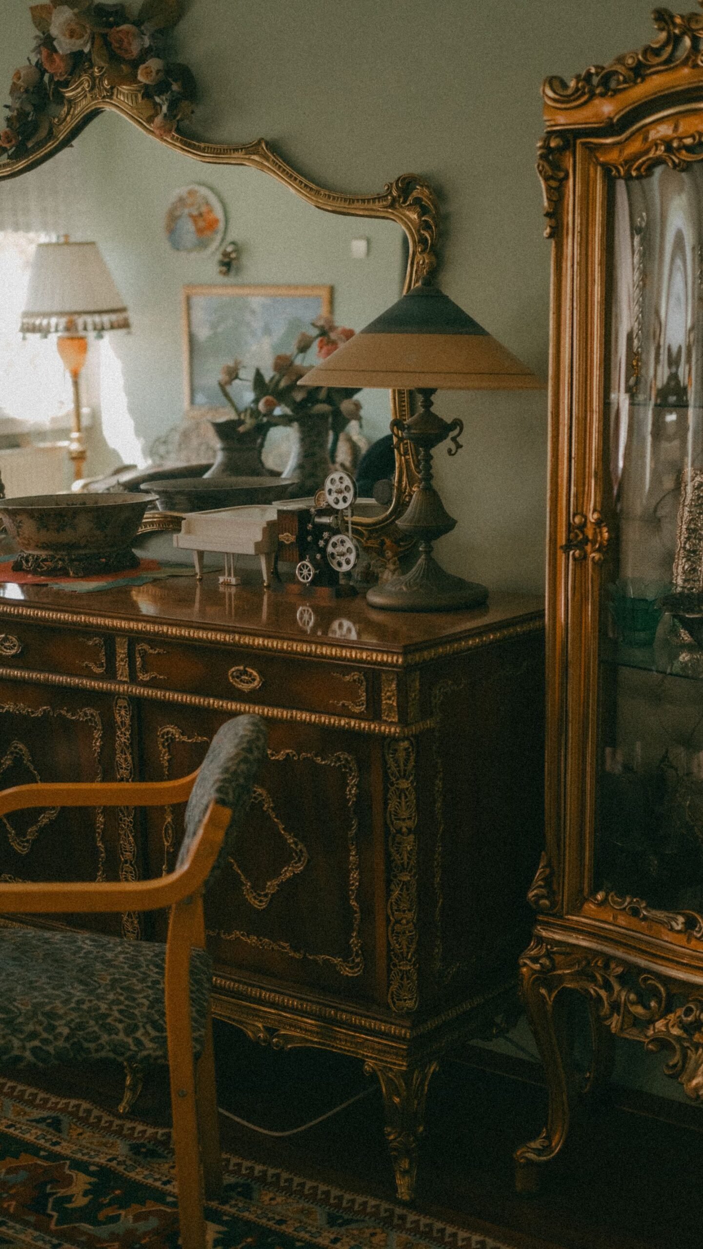 Retro room with an antique dresser and chairs.