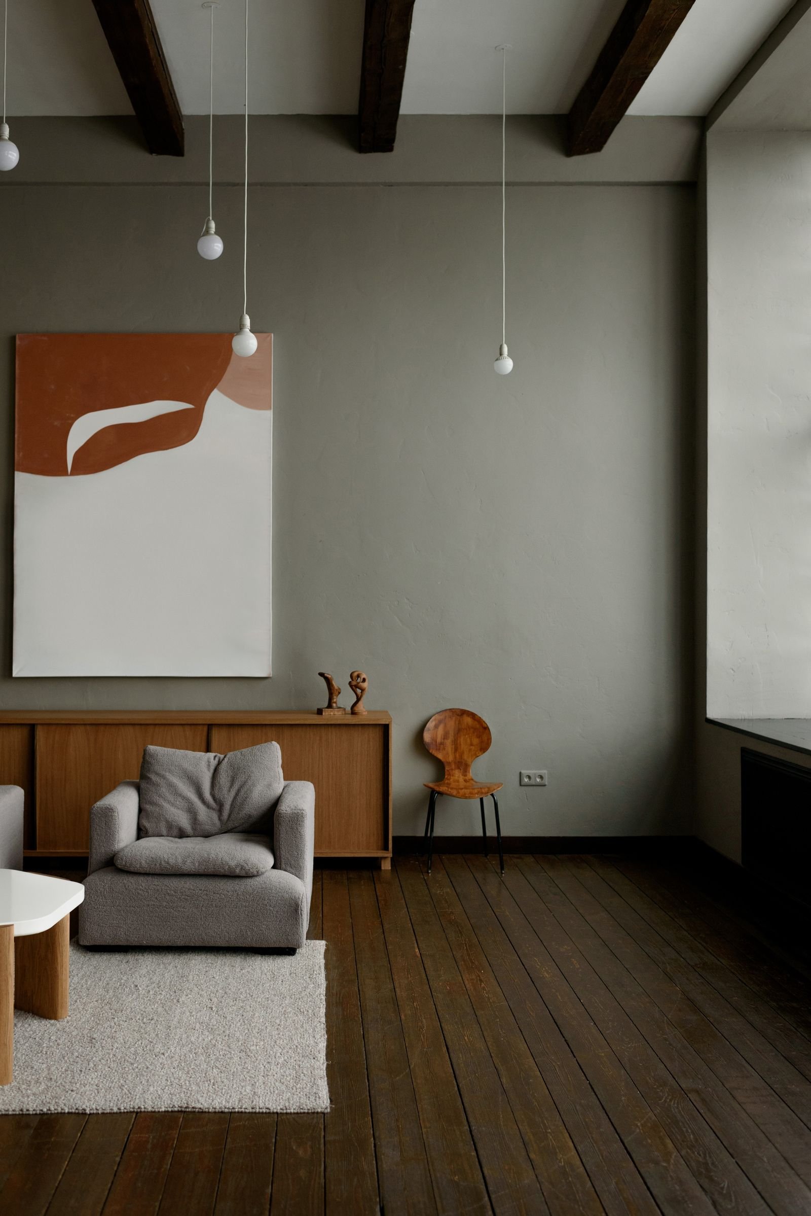 Minimalist living room with simple furniture in neutral tones