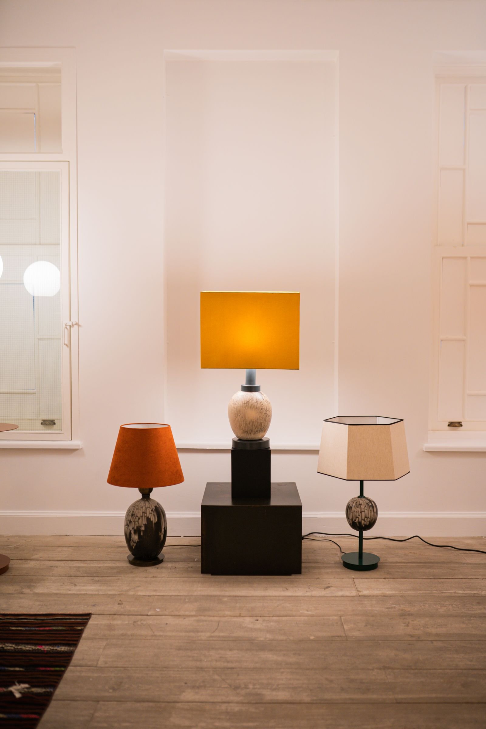 Modern living room with stylish lamps giving soft ambient light