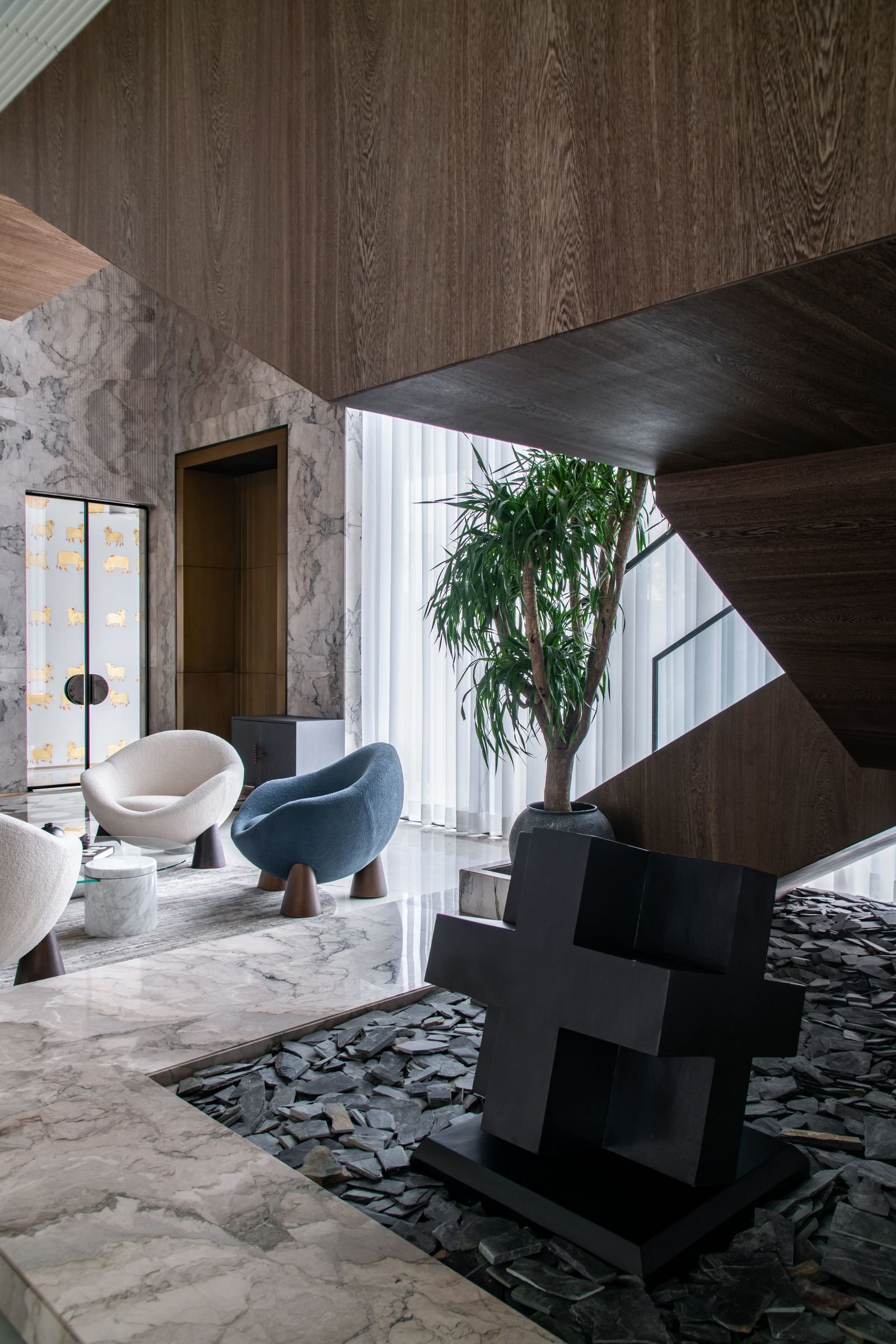 Luxury living space with contemporary furniture and marble accents
