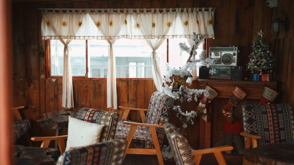 Warm and inviting rustic living room adorned with festive winter holiday decorations.